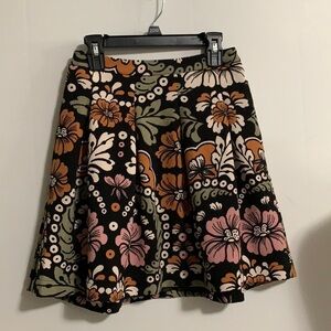 H&M flower print skirt lined with pleated flare.